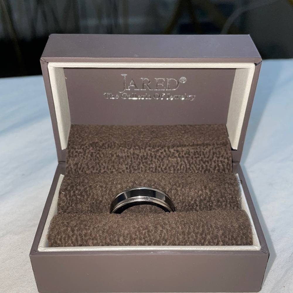 Black and silver men’s ring